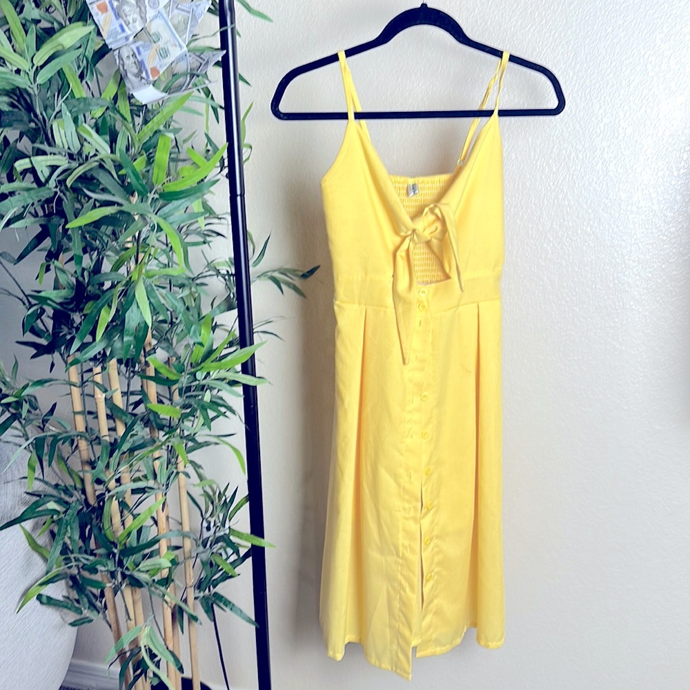 This is a fun yellow dress. Ties in the front so if you want to lift the ladies